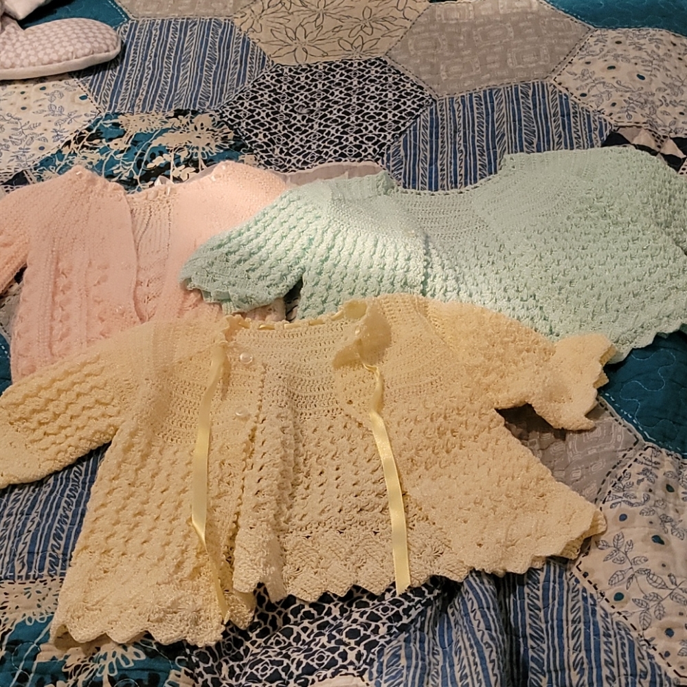 Crochet baby sweaters